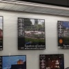 Picture of Signatures of Loudoun award poster hanging in Dulles Airport lobby